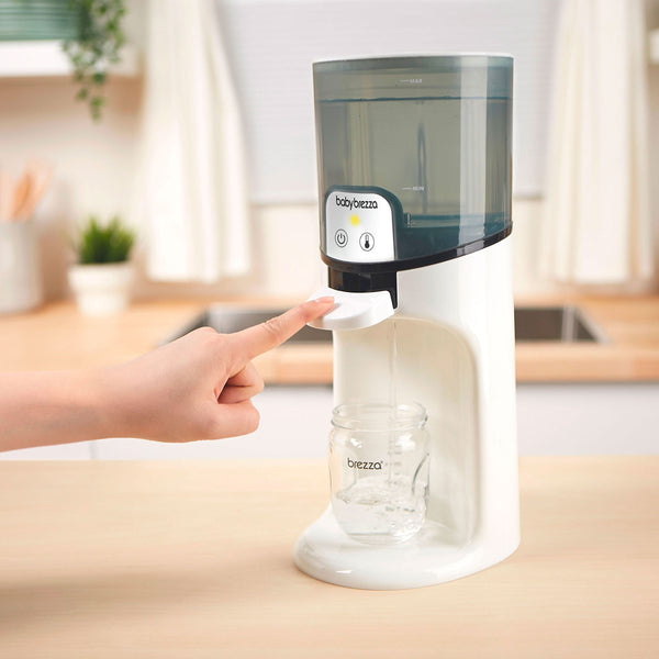 EN Baby Brezza Instant Water Warmer dispensing water with a touch  - product thumbnail
