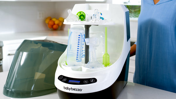 Baby Brezza Bottle washer pro open with bottles and parts in kitchen  - product thumbnail